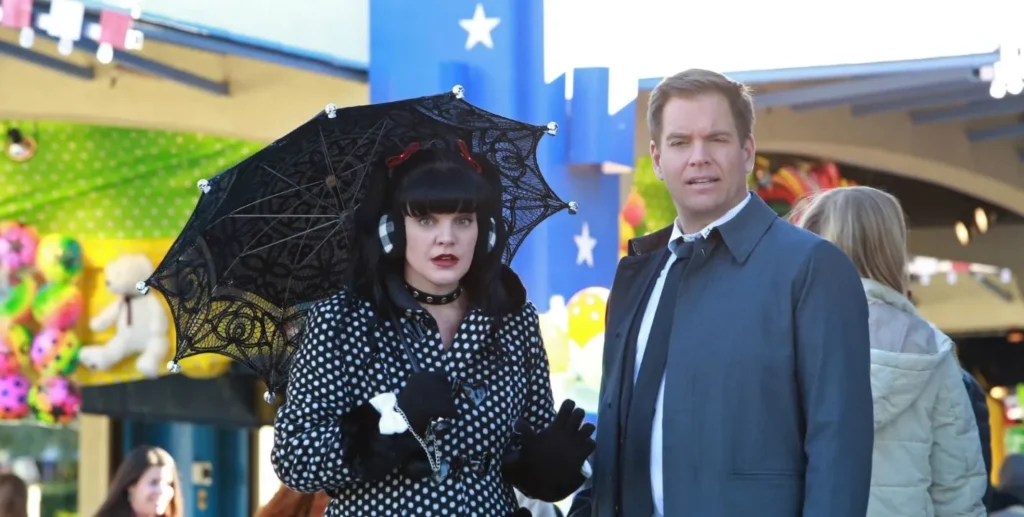 Michael Weatherly and Pauley Perrette laughing on the NCIS set