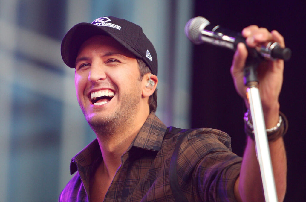 Luke Bryan Takes a Tumble, But His "Meat Back There" Saves the Day!