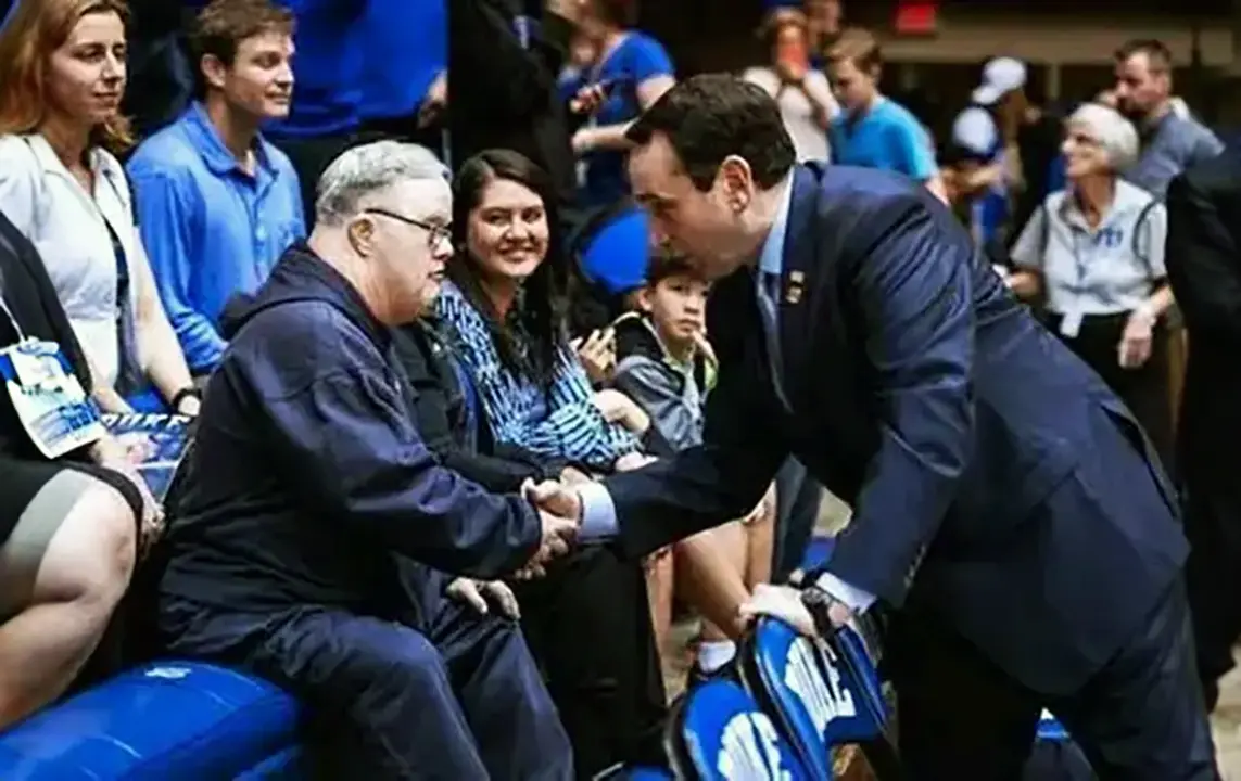 Steve Mitchell and Coach K shaking hands at Cameron Indoor Stadium